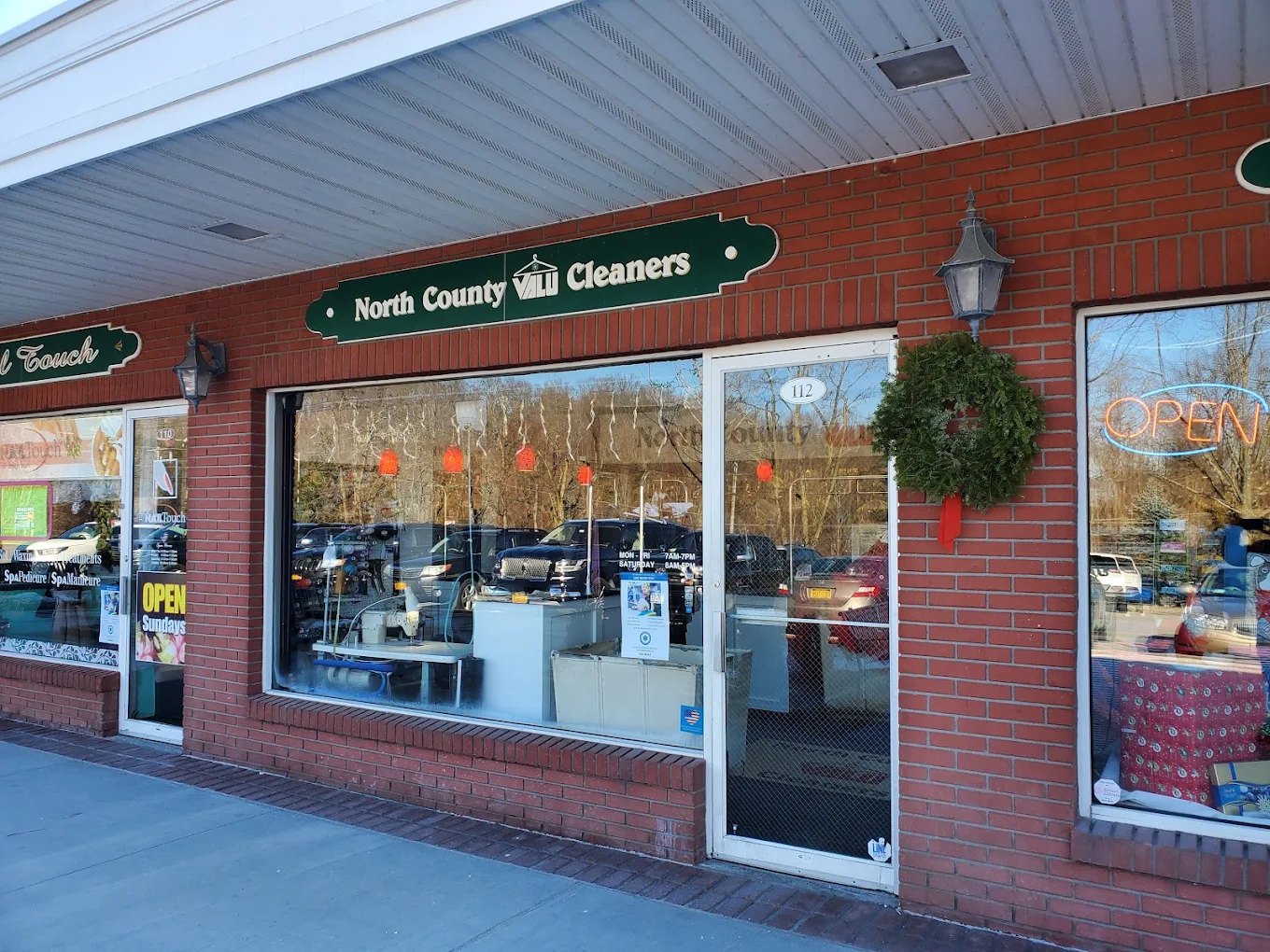 The North County Cleaners storefront with its green sign